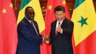 President Macky Sall shakes hands with the President of China, Xi Jinping: