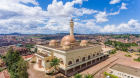 The famous Gadaffi Mosque at Old Kampala Hill. Photo by Run Tours and Travels.<br /><br />Unfortunately for the Islamic fraternity in this country, this will become a lesson to them that putting up religious shrines anywhere and everywhere does not justify those lands or places to be sacred(Holy). Even Jesus when he entered the marvellous and holy temple in Jerusalem some 2000 years ago, he found it turned into a market place. He had to use force to educate human spiritualism! These Ganda lands with Muslim properties are owned and leased out by the Native Ganda people who must have the last say in all this present and atrocious business of any how grabbing indigenous African lands. Those are bygone days when strangers used to walk into many countries especially on the continent of Africa, and started demanding from the native peoples this and that and afterwards decide to take over all lands from their abode. These present debts owed to Mr Justus Kyabahwa, a loan shark by the few moslem clique are private debts. That is why we are telling the IMF, China and the World Bank that they lend the country of Uganda private debts at their own peril. They must not expect all the people of Uganda to pay such misused debts!