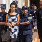 Diane Rwigara (centre), a prominent critic of Rwanda&#039;s President Paul Kagame, is escorted by police officers to the court room at the Nyarugenge intermediate court in Kigali on October 9, 2017. PHOTO | CYRIL NDEGEYA <br />Rwanda government is a minority governed country of the African tribe of Tutsi tribesmen: The rest of the majority tribes people have got to obey all the rules or go to prison.