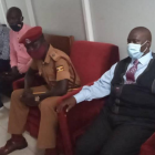 Civil servant Mr Geoffrey Kazinda, seated nearest the picture in a suit spending his many times in the NRM courts of law that are fighting corruption that seems never to end.<br />So now how has the tax payer, whose money has been squandered left, right and center gained from this judicial decision?<br /><br />Is this civil servant capable of paying back this money when he has not been making a living? <br /><br />The tax payers have been at it paying for his livelihood some years now and counting!<br /><br />If his finger had been cut off by a doctor in court due to endemic corruption in this country, this civil servant would have stayed on his employment, and paid back the money stolen.<br /><br />He could even have been able to report those who facilitated such state corruption for them to have their fingers cut off as well!<br /><br />Surely tax payers in this country should stand up together and stop Tom and Harry to come from anywhere and over there and eat their money as if there is no tomorrow!
