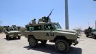 The Burundian African Union peacekeepers in Somalia travel in an armored vehicle as they leave the Jaale Siad Military academy, in Mogadishu, Somalia.<br />Well if the mandate of these African killing wars end in 2024 by the UN, why are the African public being told all the political lies that are possible that national democratic elections are going to happen this year 2022?<br />One is of the opinion that Somalia must come together including Al Shabab to start talking African peace and development!<br />USA that wanted very much to interfere in all the political corners of the world has subsidized<br />Even the Afghanistan guerrillas are learning the hard way to govern and lead their people to God&#039;s Heaven in a civilized way?<br />The more these African antagonists and protagonists fight the worst it becomes for Somalia to ever become a peaceful African nation. And it is unfortunate indeed that  most of the other African Union countries are training their armies to become mercenaries to make a good living out of such mass murder. They are buying more sophisticated military equipment for a war that will not end. And African leaders, as Putin named them, are buying military arms to gradually turn these armaments against their own people away from Somalia.