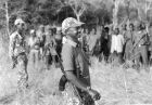 Then rebel leader Museveni in the bush with his fighters.