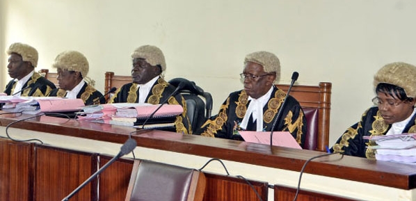 Constitutional Court judges Cheborion Barishaki, Remmy Kasule